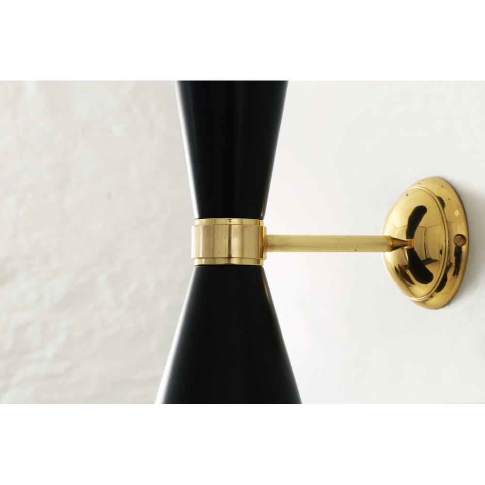 Elegant Cairo Wall Sconce in Polished Brass and Matte Black