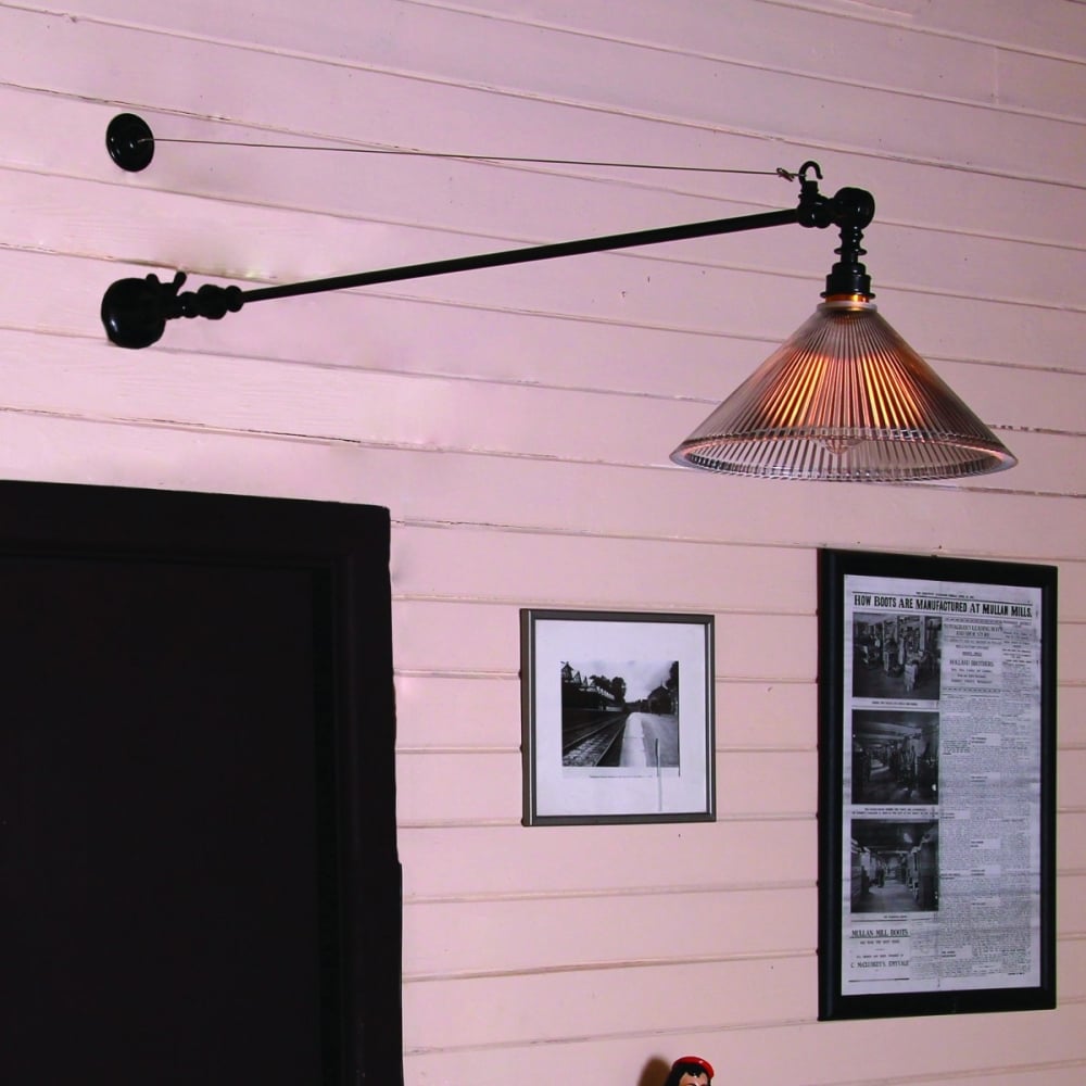 Nyx Adjustable Coolie Glass Wall Sconce in Antique Brass