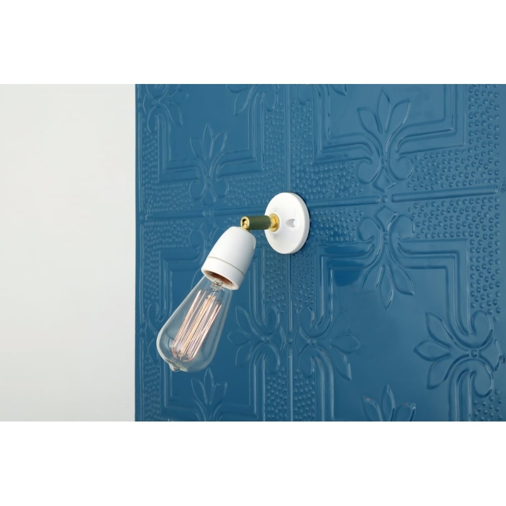 Elegant Caltra Adjustable Wall Light in Black & Brass