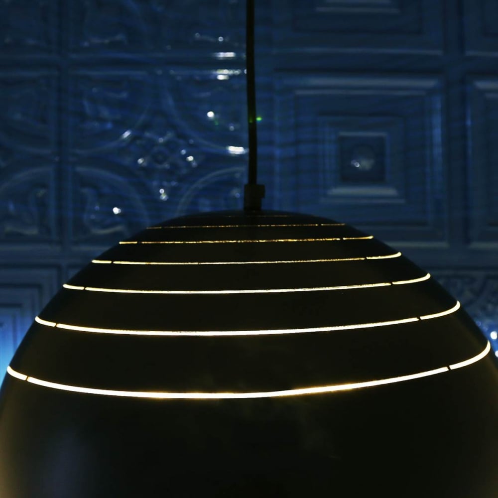 Midas Elegance: Black & Gold Leaf Pendant