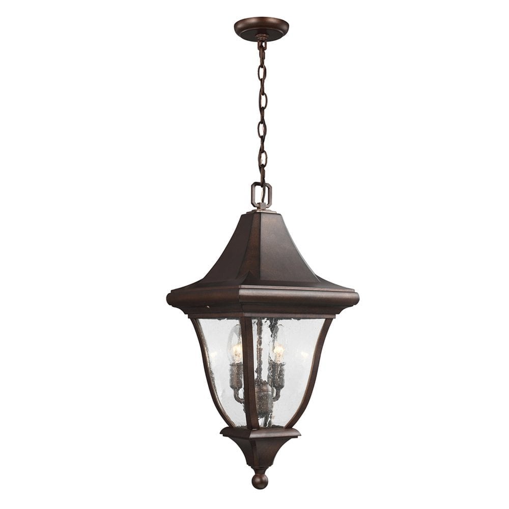 Rustic Patina Bronze Outdoor Lantern with Curved Glass Panels