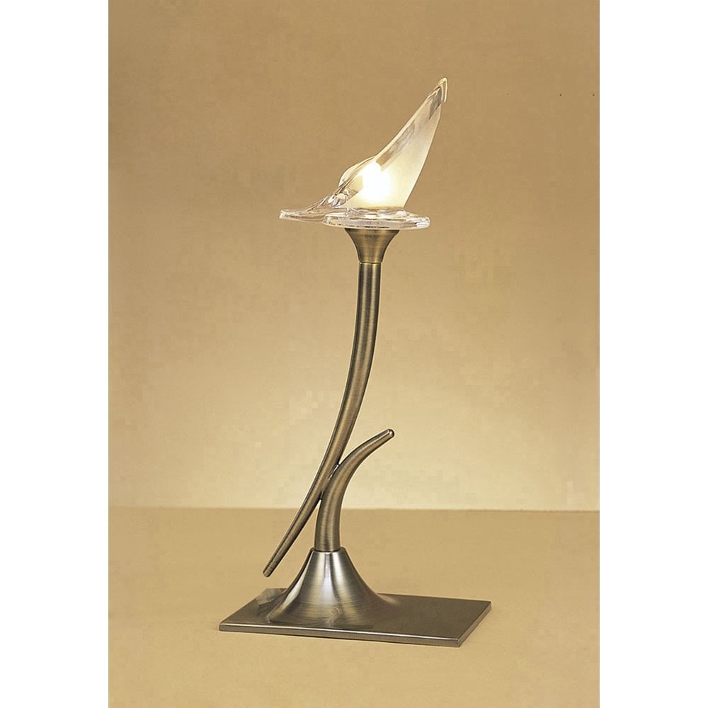 Flavia Table Lamp with Antique Brass Finish, Elegant Curves, and Frosted Glass Shade