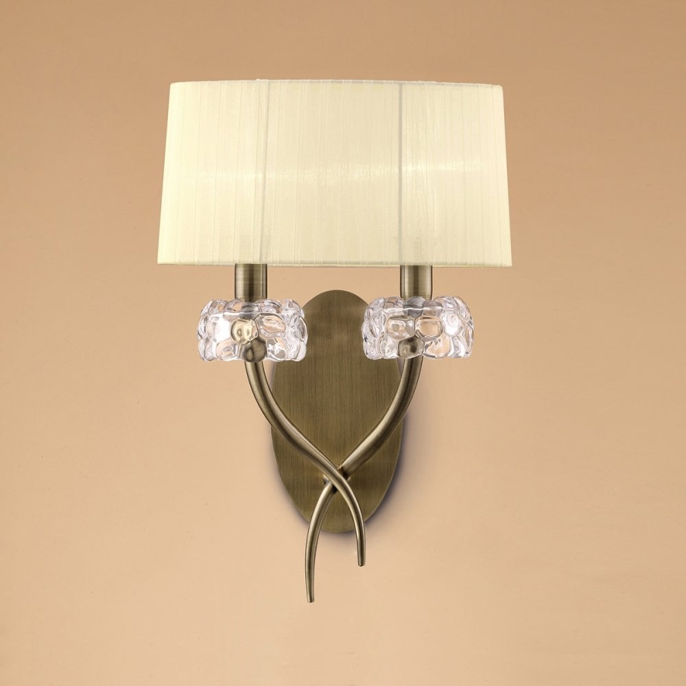 Loewe Twin Arm Wall Lamp in Antique Brass with Cream Shade
