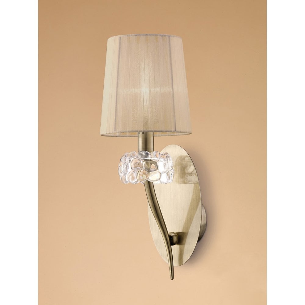 Loewe Antique Brass Wall Lamp with Soft Bronze Finish and Elegant Designs