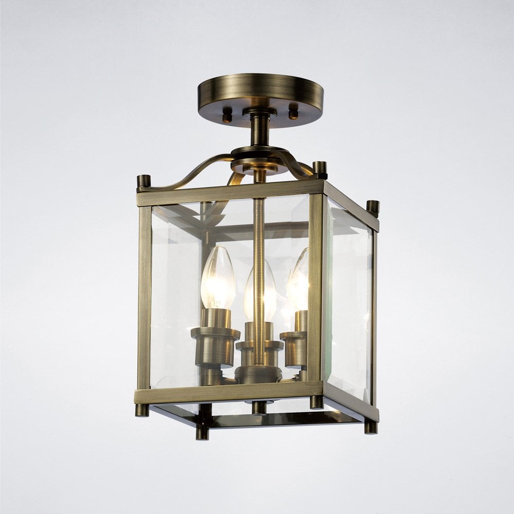 Aston Semi Flush Mount 3-Light Fixture in Antique Brass with Clear Glass