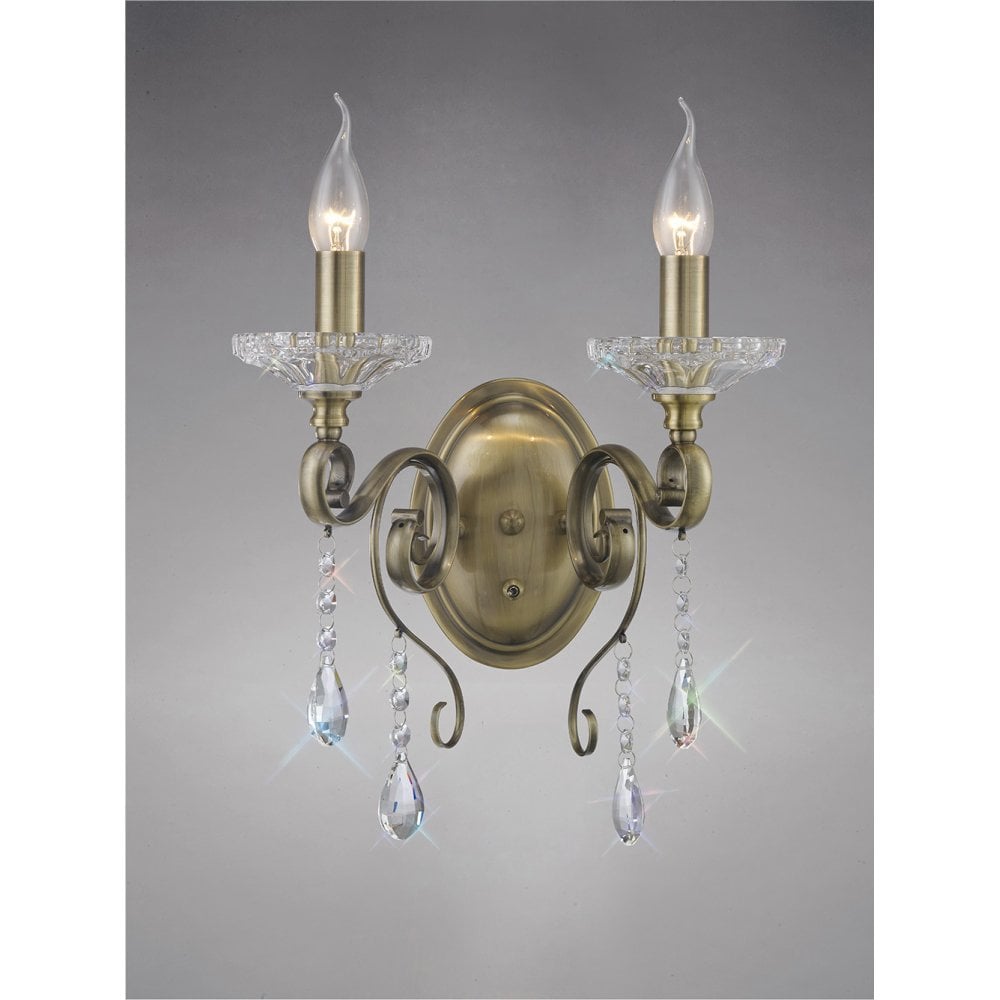 Elegant Libra Dual Light Wall Sconce in Antique Brass with Clear Crystal Accents