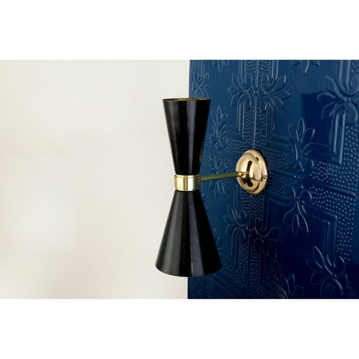 Elegant Cairo Wall Sconce in Polished Brass and Matte Black
