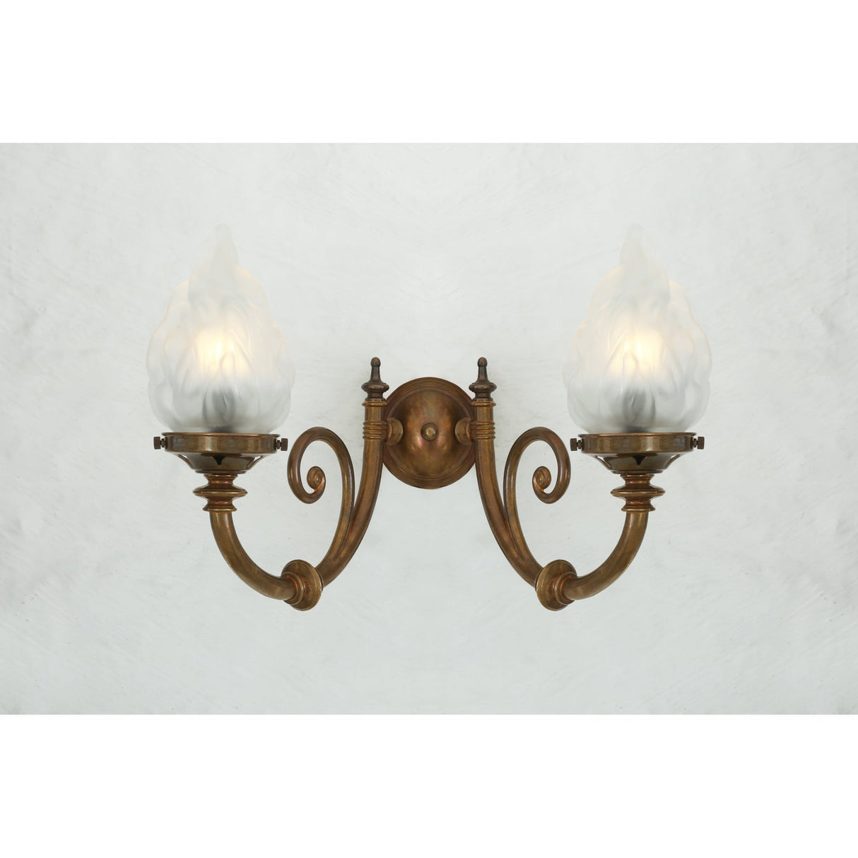 Darwin Antique Brass Double Arm Wall Sconce with Flame Glass Shades