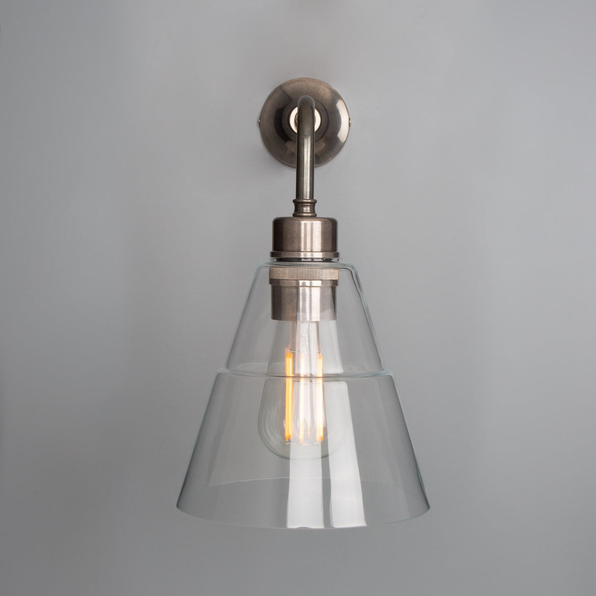 Lyx Antique Brass Wall Sconce with Clear Cone Glass Shade