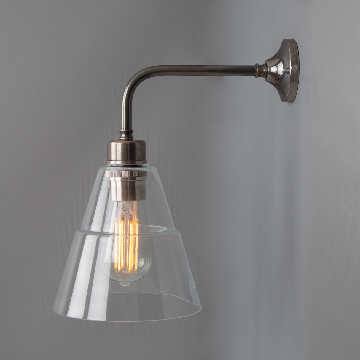 Lyx Antique Brass Wall Sconce with Clear Cone Glass Shade