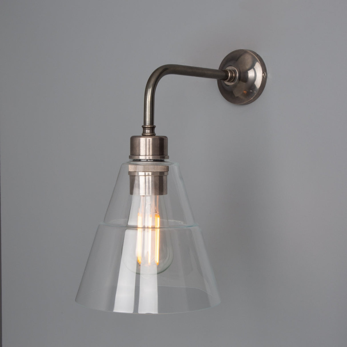 Lyx Antique Brass Wall Sconce with Clear Cone Glass Shade
