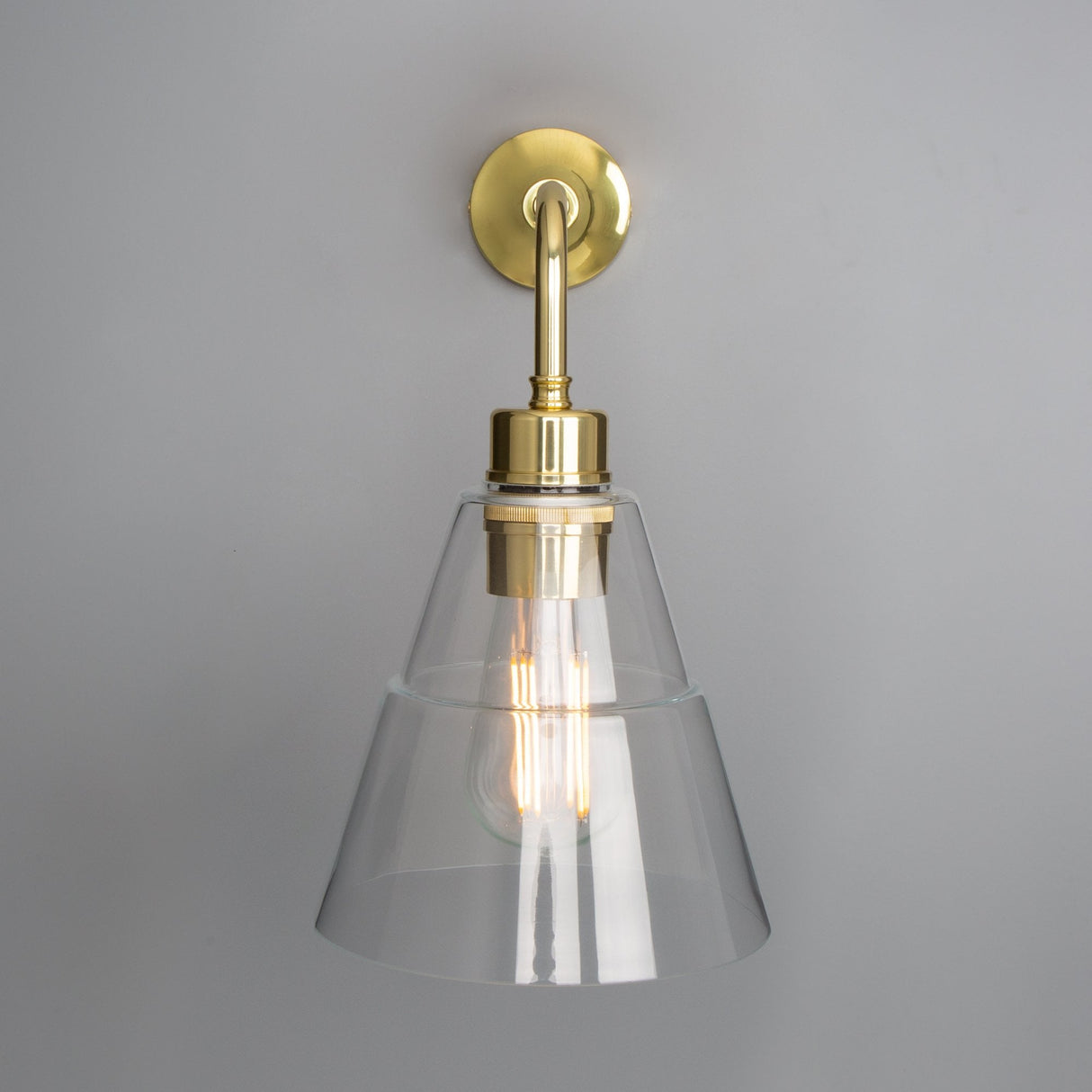 Lyx Antique Brass Wall Sconce with Clear Cone Glass Shade
