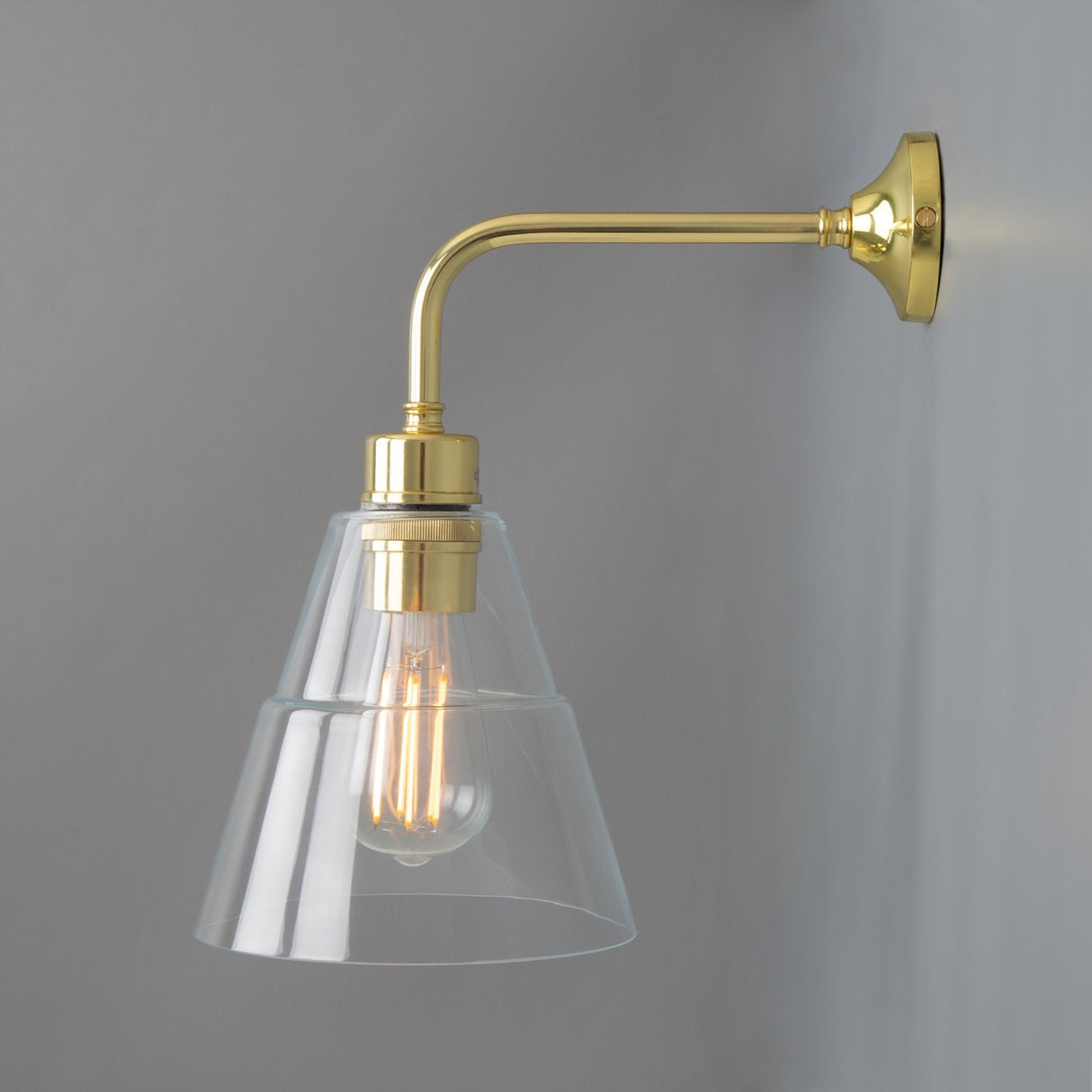 Lyx Antique Brass Wall Sconce with Clear Cone Glass Shade