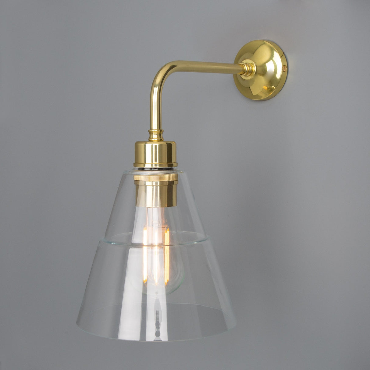 Lyx Antique Brass Wall Sconce with Clear Cone Glass Shade