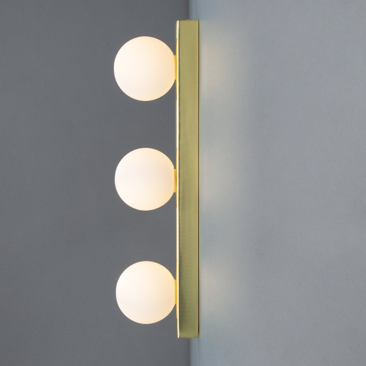 Noelani Antique Brass Vanity Wall Light with Frosted Glass