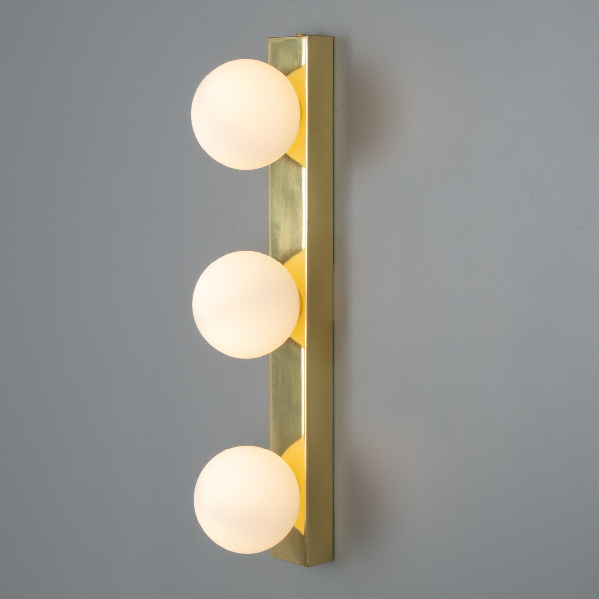 Noelani Antique Brass Vanity Wall Light with Frosted Glass