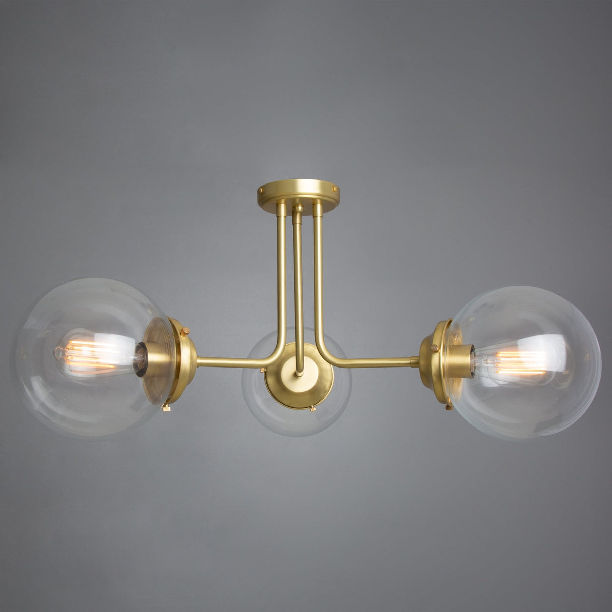 Antique Brass Hayes Ceiling Flush with Clear Glass Globes