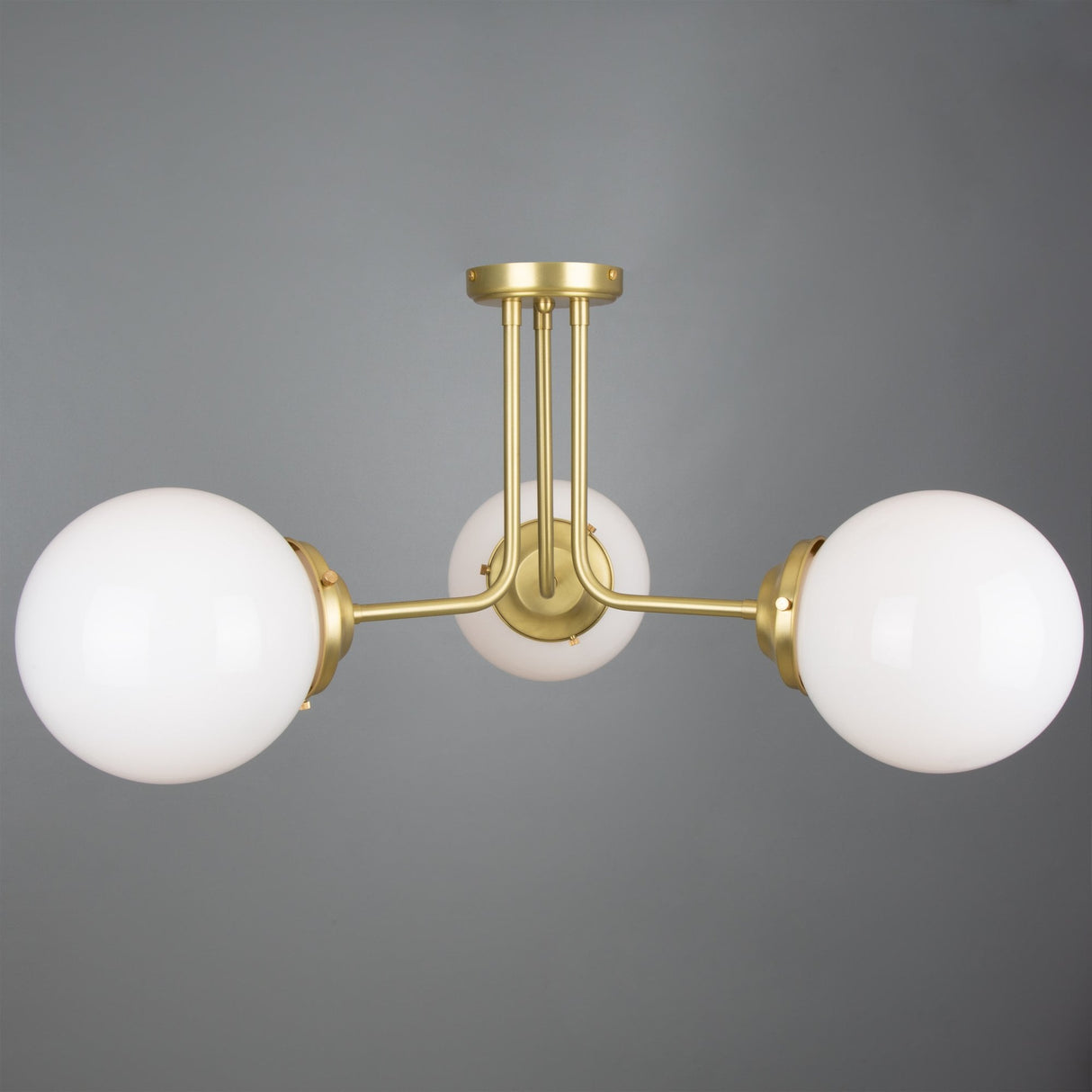 Antique Brass Hayes Ceiling Flush with Clear Glass Globes