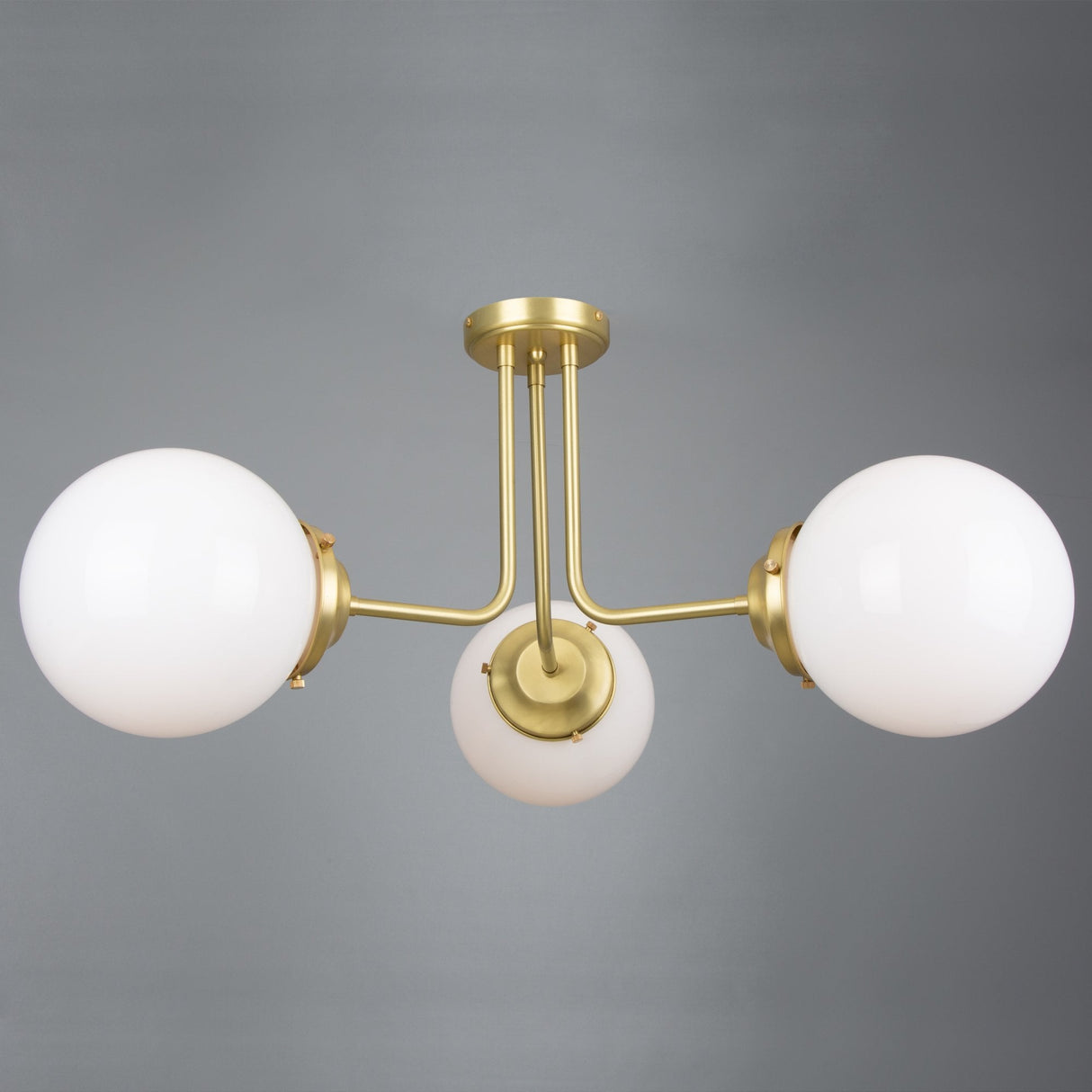 Antique Brass Hayes Ceiling Flush with Clear Glass Globes