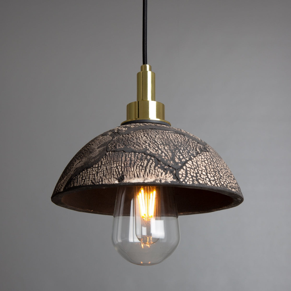 Kingii Pendant Light - Black Clay and Antique Brass Elegance