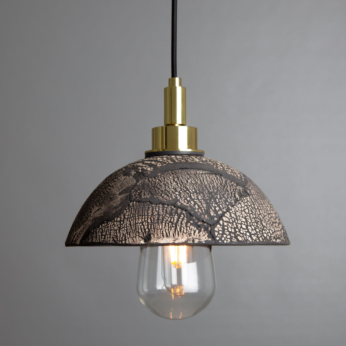 Kingii Pendant Light - Black Clay and Antique Brass Elegance