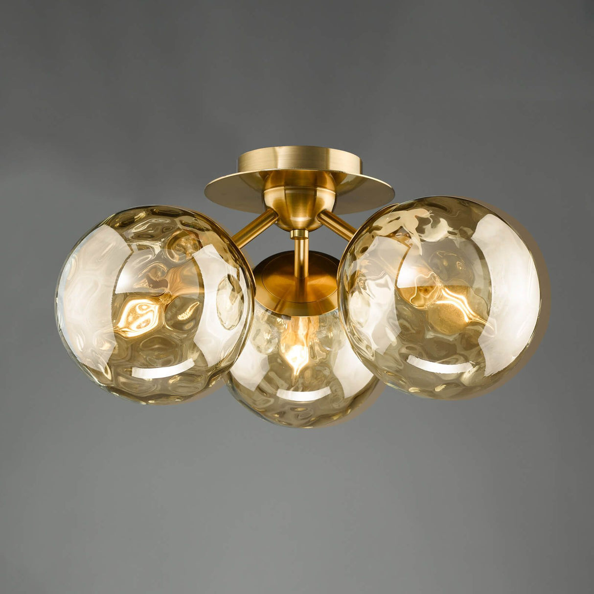 Ulrika 3 Light Flush Antique Brass and Amber Glass