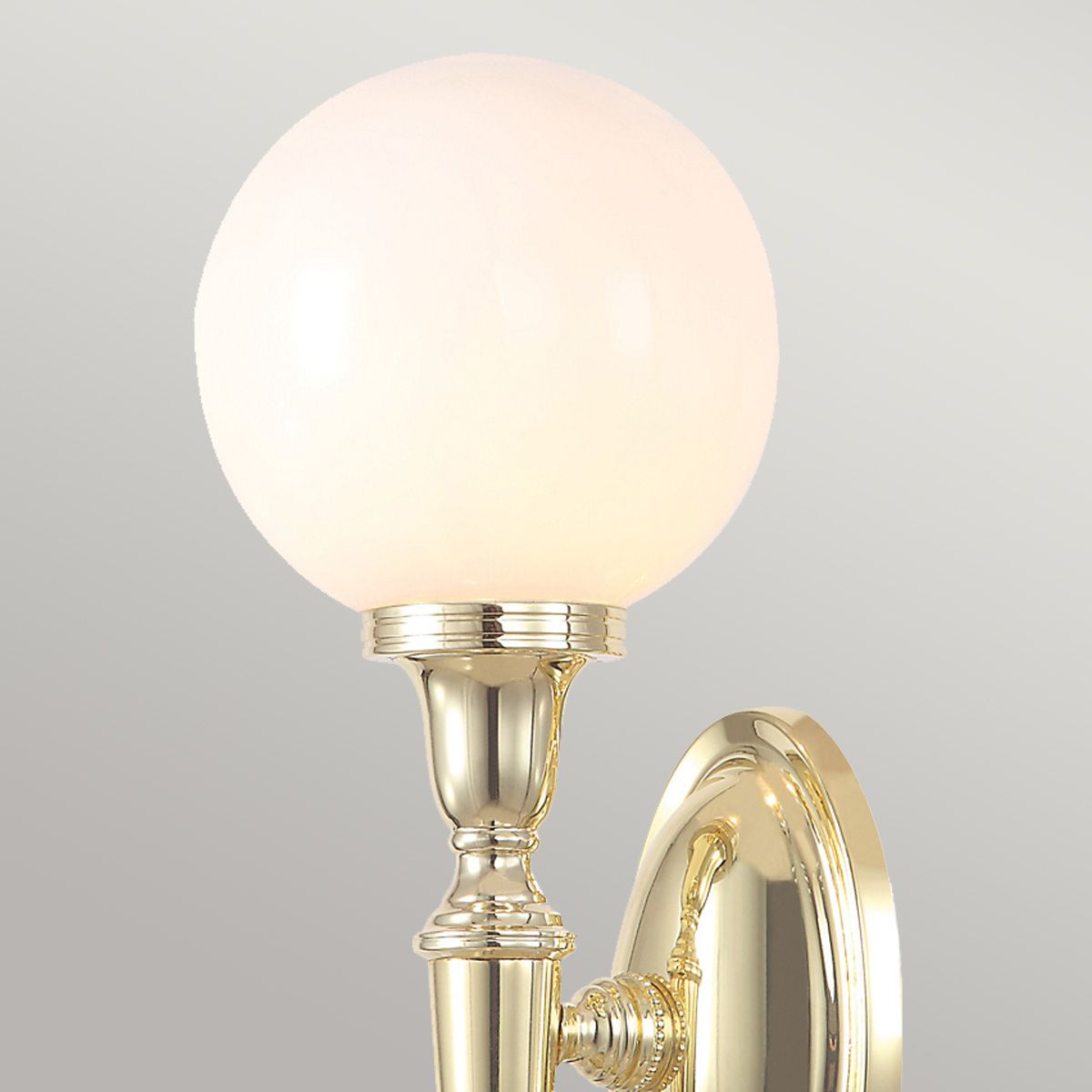Elegant Polished Brass Globe Wall Light with LED Bulb