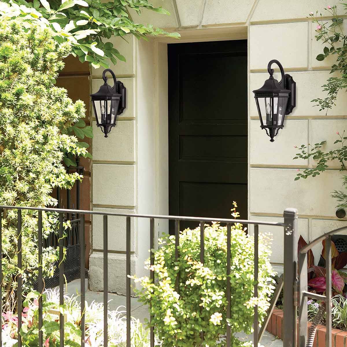 Elegantly Crafted Black Double-Bulb Wall Lantern with Clear Beveled Glass