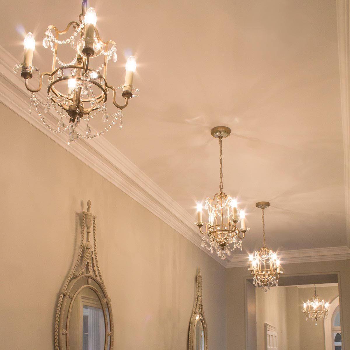Vintage Elegance: Crystal-Embellished 4-Light Chandelier in Gilded Silver Finish