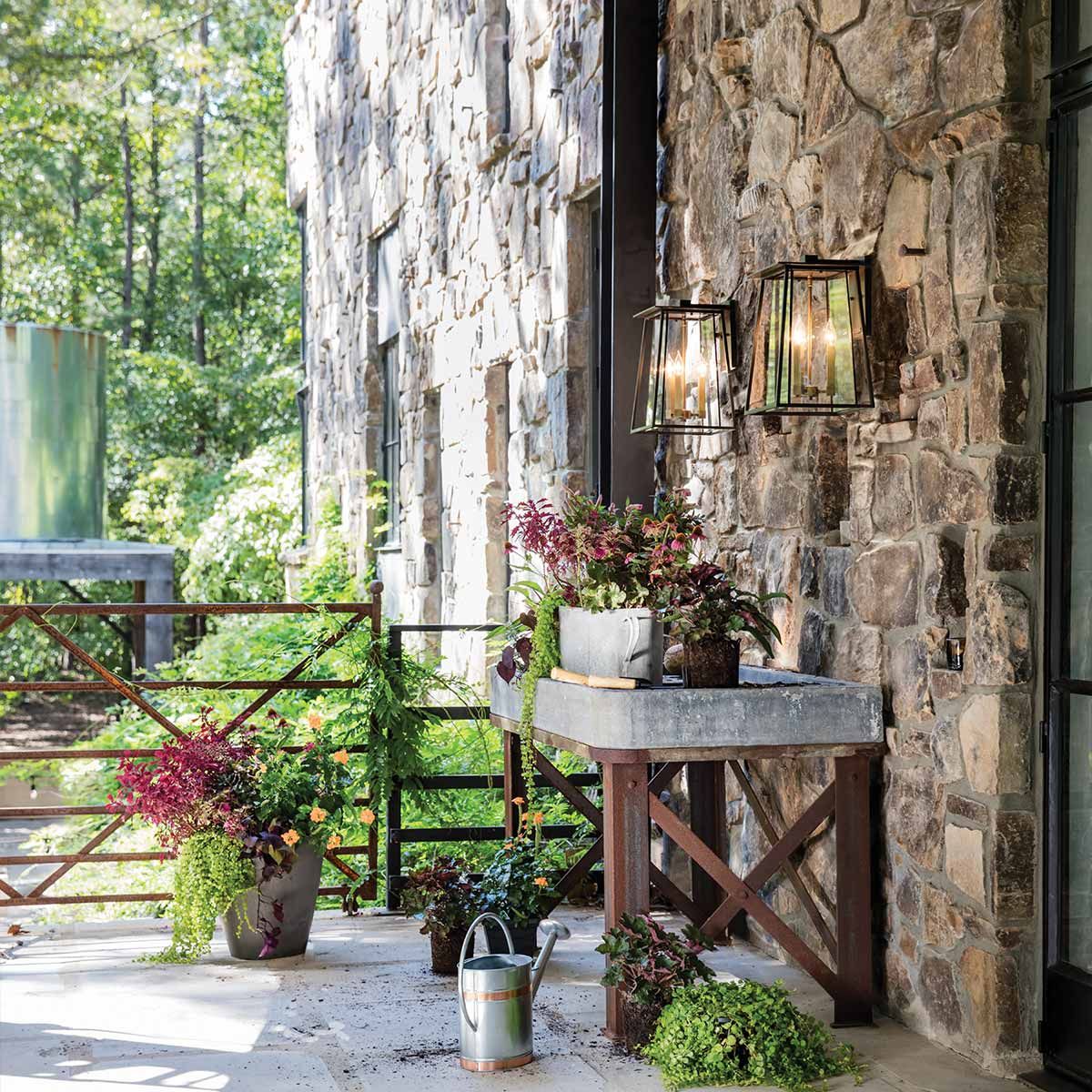 Walker Wall Lantern: Rustic Elegance in Buckeye Bronze and Brass
