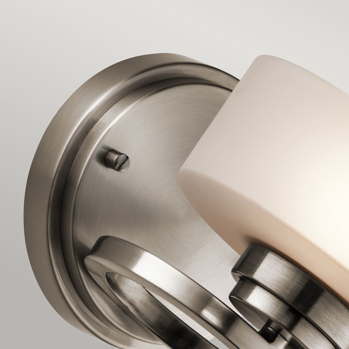 Aleeka Contemporary Pewter Wall Sconce with Frosted Glass Globe