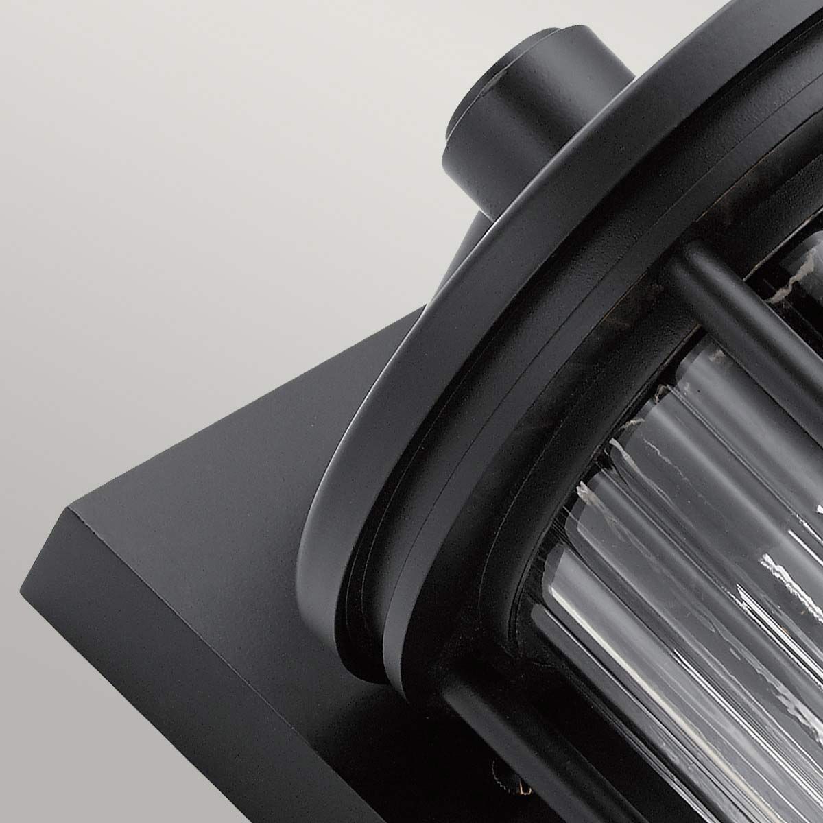 Elegant Black Outdoor Wall Lantern with Clear Ribbed Glass