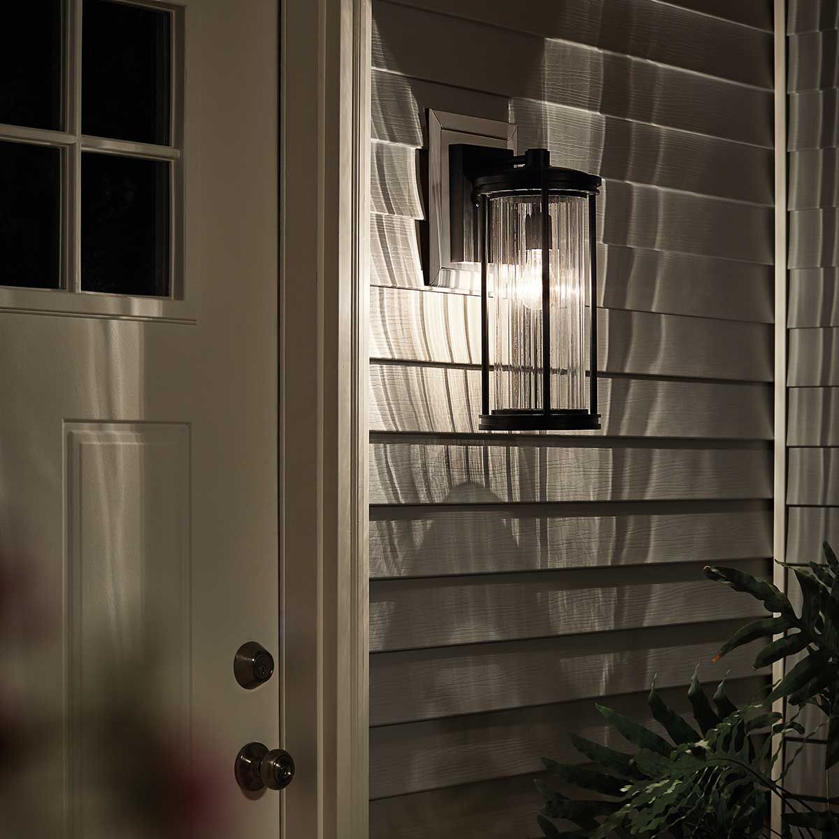 Elegant Black Outdoor Wall Lantern with Clear Ribbed Glass