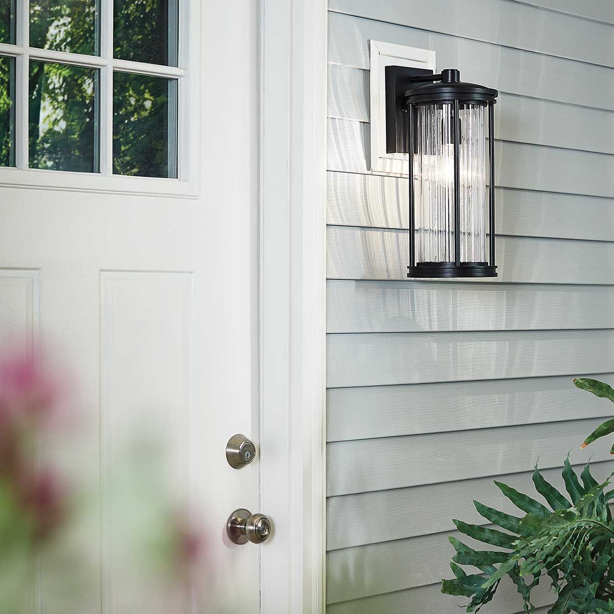 Elegant Black Outdoor Wall Lantern with Clear Ribbed Glass