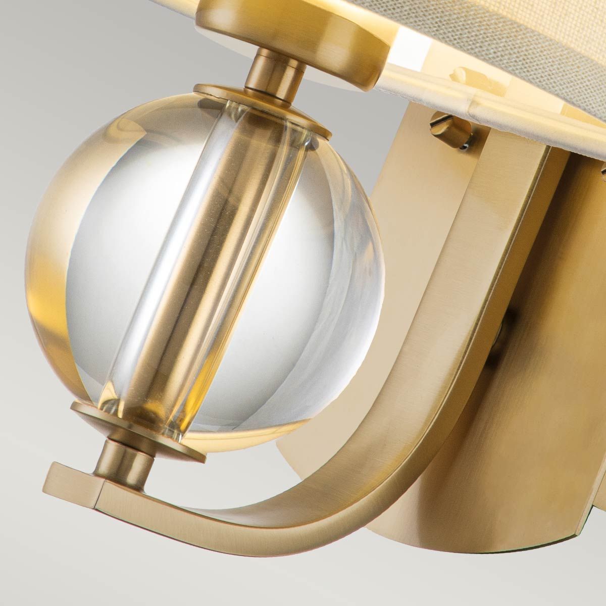 Gotham Brushed Brass Wall Light with Cream Shade