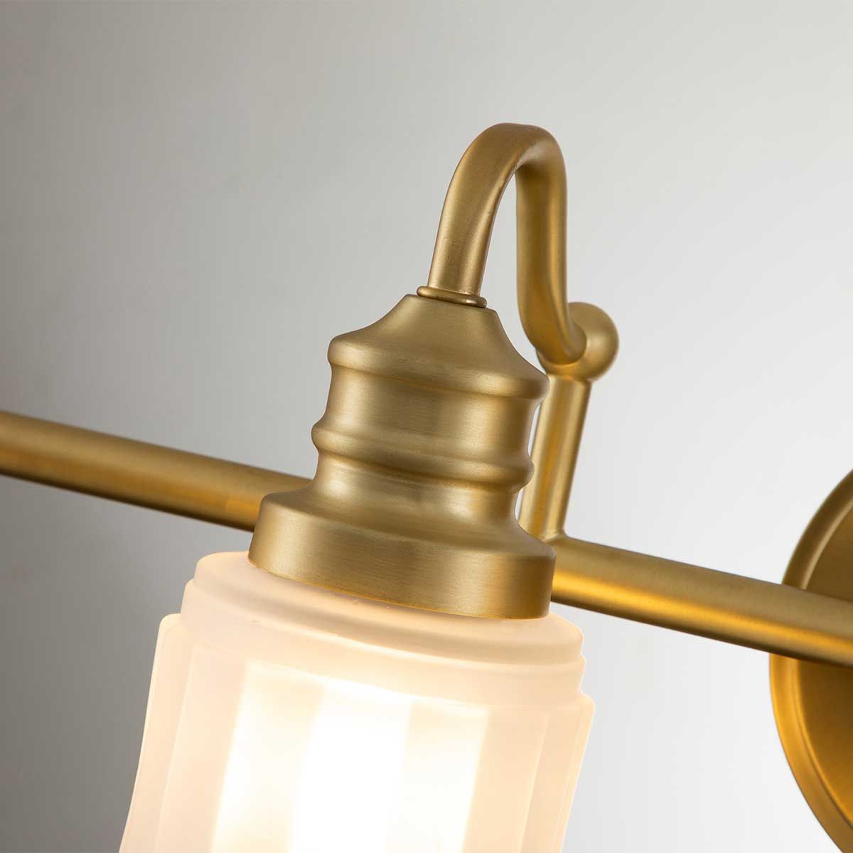 Timeless Elegance: Swell Brushed Brass 4-Light Wall Fixture