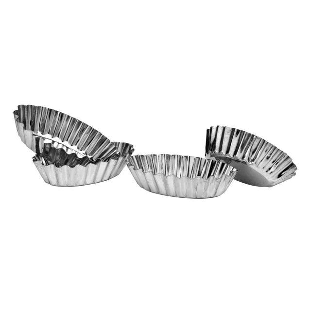 Set Of Four Oval Fluted Small Cake Moulds