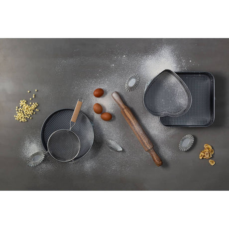 Set Of Four Oval Fluted Cake Moulds