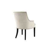 Legacy Dining Chair: Clarck Sand Upholstery with Antique Brass Accents and Black Legs