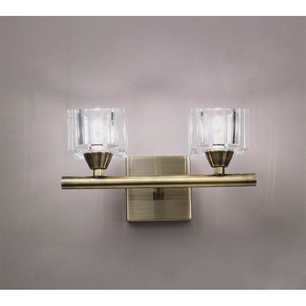 Cuadrax Dual Light Wall Fixture in Antique Brass with Rocker Switch