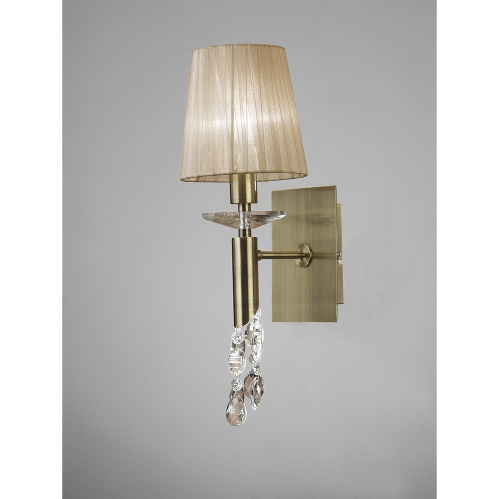 Elegance in Illumination: Tiffany Antique Brass Crystal Wall Lamp with Soft Bronze Shade