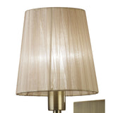 Elegance in Illumination: Tiffany Antique Brass Crystal Wall Lamp with Soft Bronze Shade