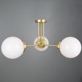 Antique Brass Hayes Ceiling Flush with Clear Glass Globes
