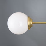 Antique Brass Hayes Ceiling Flush with Clear Glass Globes