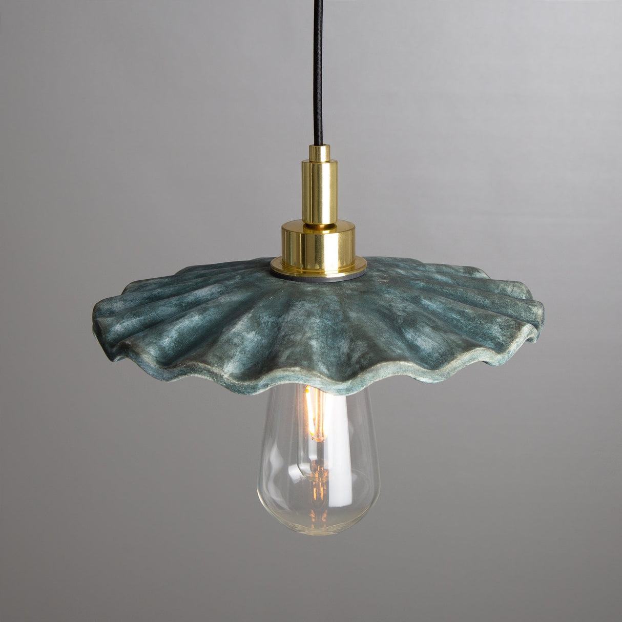 Kirhii Pendant - Blue Earth Elegance in Antique Brass