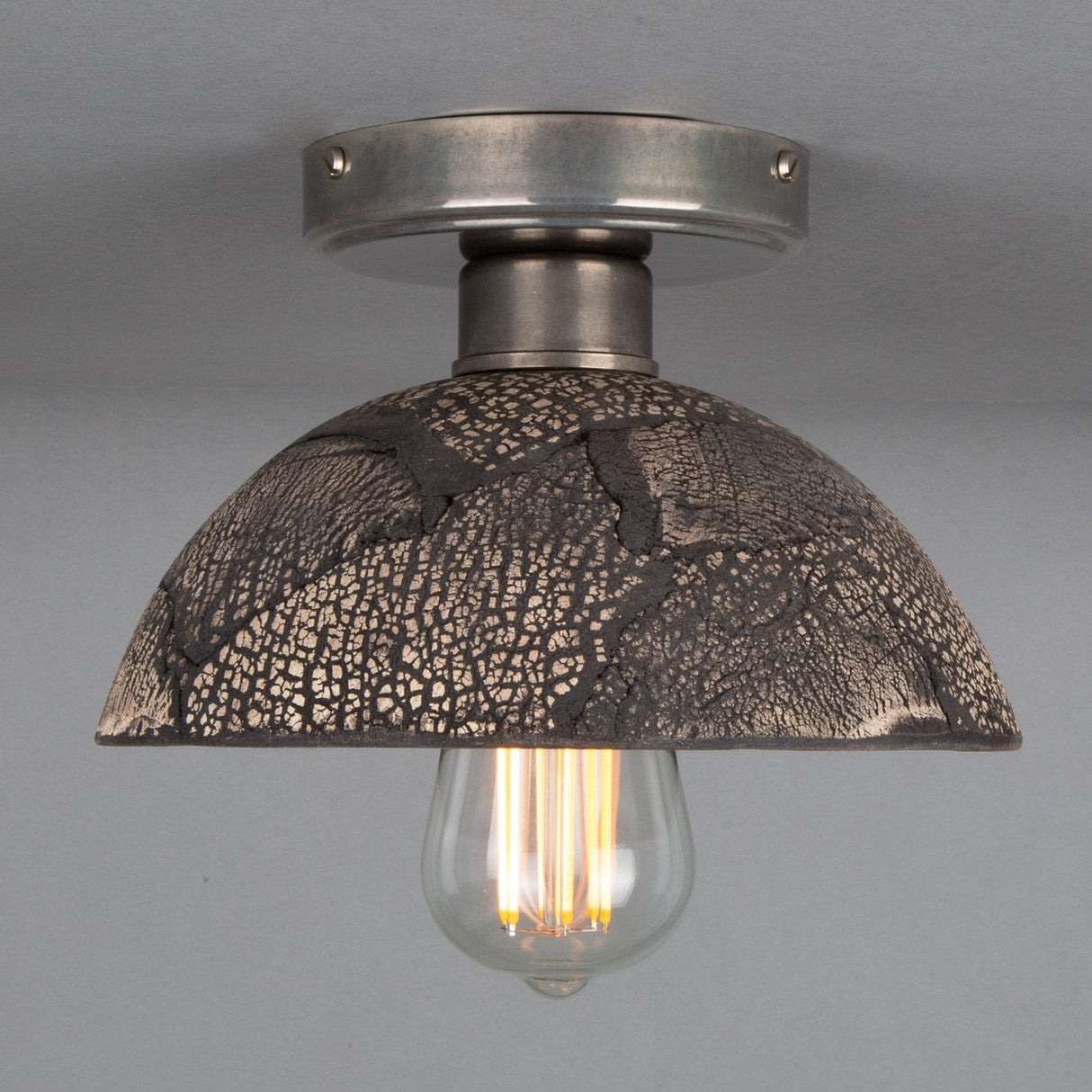 Kauri Ceiling Light - Black Clay and Antique Brass Elegance