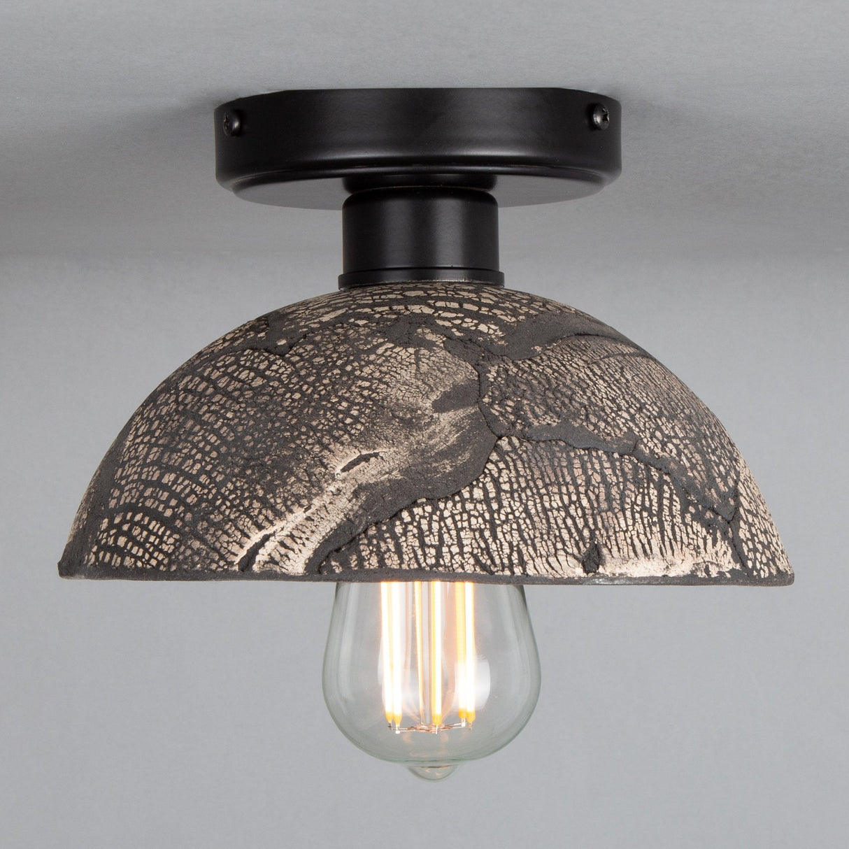 Kauri Ceiling Light - Black Clay and Antique Brass Elegance