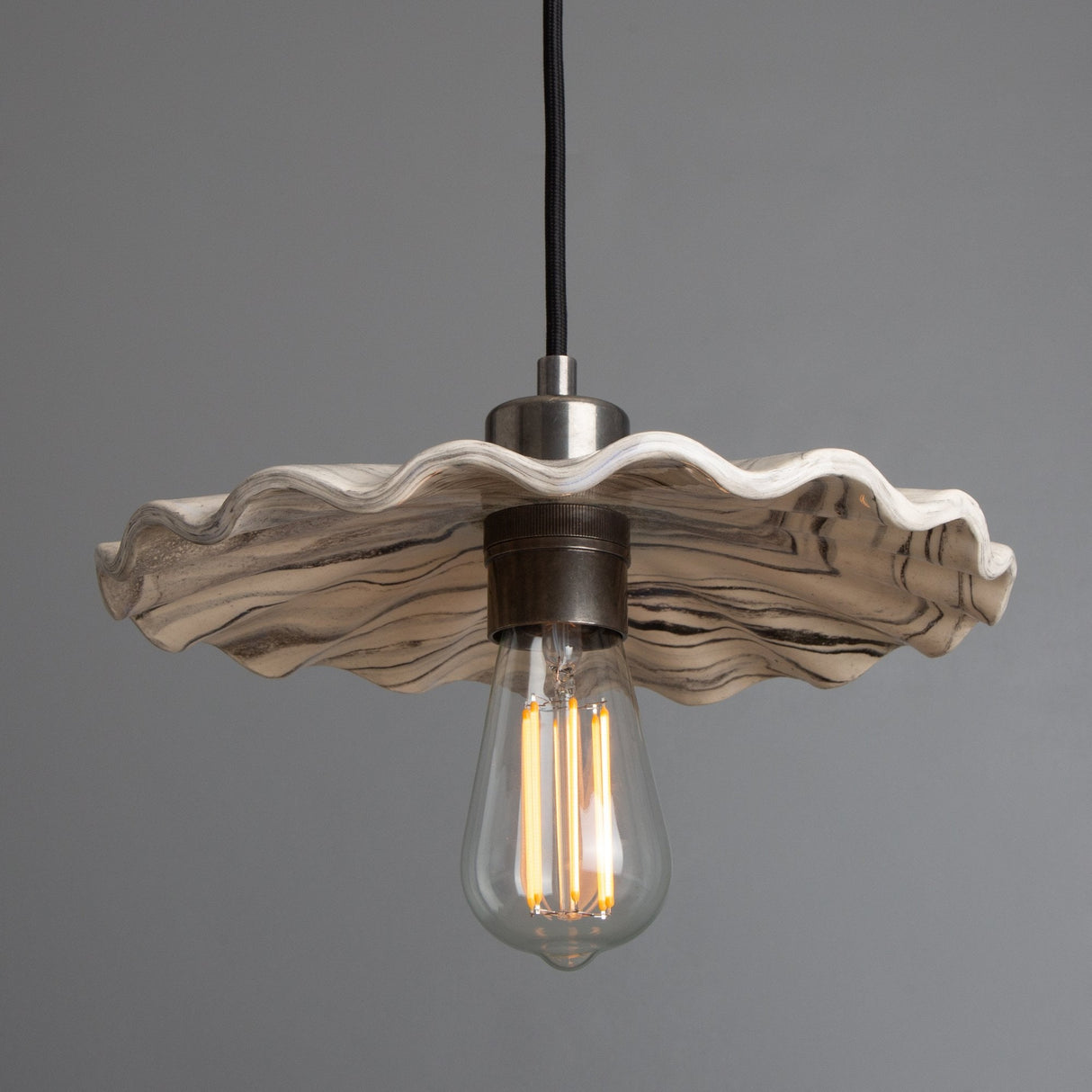 Marbled Ceramic Ripple Pendant in Antique Brass Finish