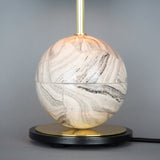 Byrd Marbled Ceramic Globe Lamp, Brass & Black Matte Finish