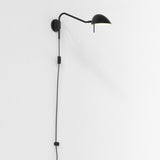 Matte Black Serge Wall-Mounted Plug-In Light